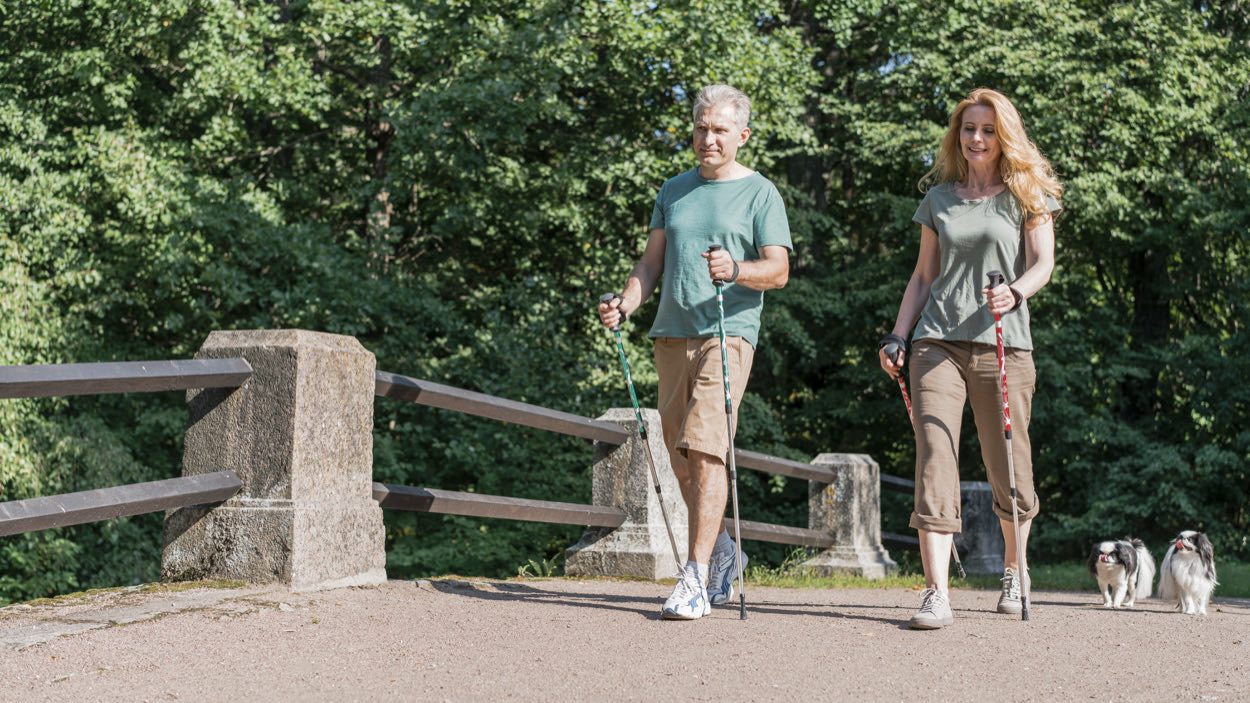 Person walking outdoors on a simple health routine.